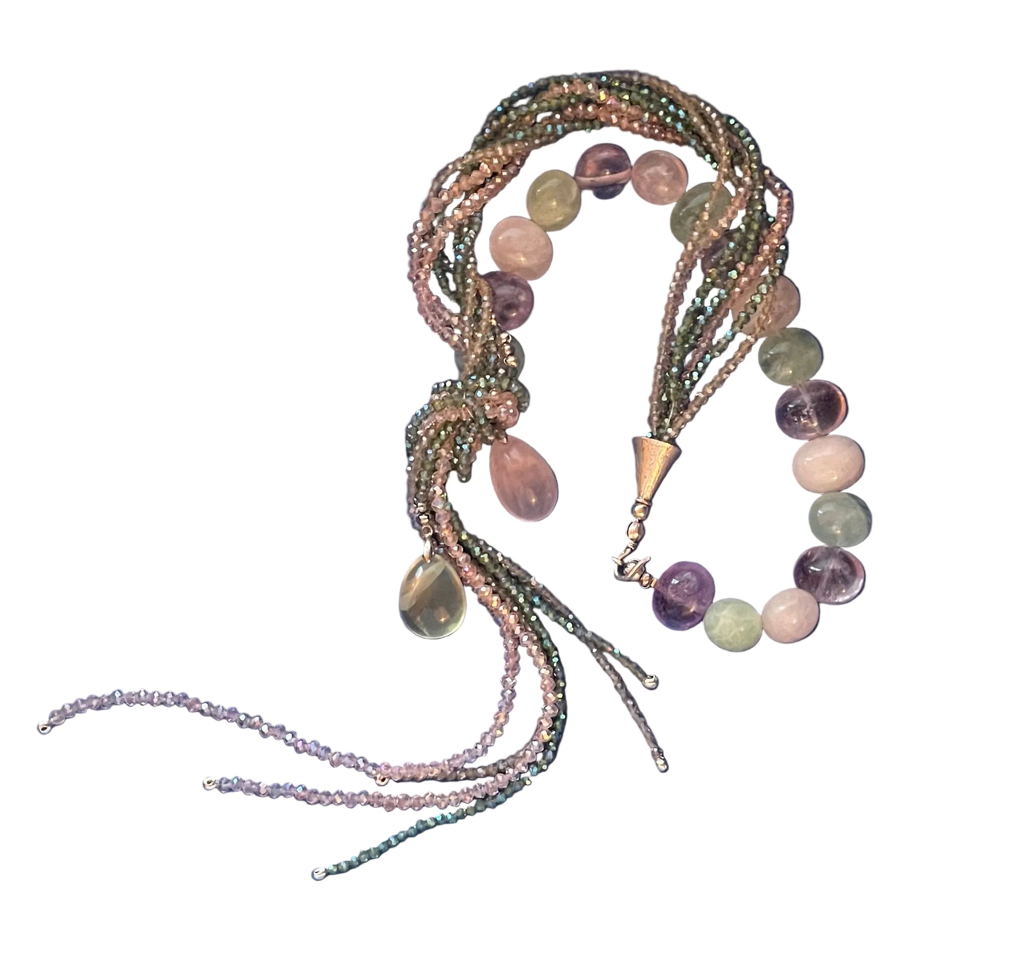 Fluorentin stones in soft shades of violet, pink and green form a lariat with one side bigger and the other smaller stones.  Cone and clasp are 24K gold vermeil.  Mesmerizing piece!