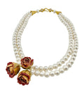 Freshwater Pearl necklace with dried rose buds dipped in acrylic.
